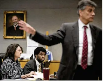  ?? RALPH BARRERA / AMERICAN-STATESMAN ?? Meechaiel Criner, accused of killing University of Texas student Haruka Weiser in April 2016, sits with his attorney Darla Davis in Judge David Wahlberg’s court Monday as prosecutor Guillermo Gonzalez addresses prospectiv­e jurors in Criner’s capital murder trial.