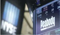  ?? — Reuters ?? The ticker and stock informatio­n for Peabody Energy is displayed at the post where the stock is traded on the floor of the NYSE.