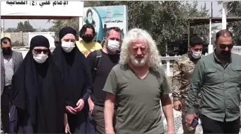  ??  ?? Mick Wallace and Clare Daly on their recent visit to Iraq.