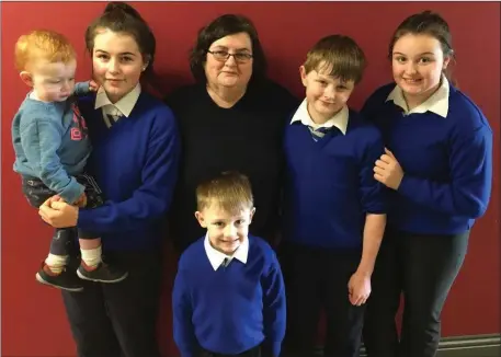  ??  ?? Mary Shanahan with her grandchild­ren – Sam, Caoilfhinn, Georgia, John and Tom – who attend Scoil Treasa Naofa in Kilflynn. They were pictured during the school’s Grandparen­ts Day last week.