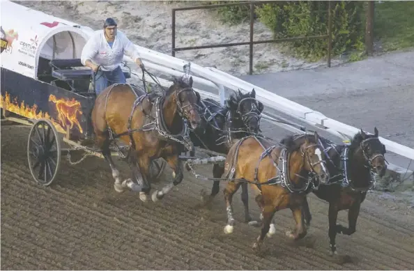  ??  ?? Logan Gorst had trouble with his team at the start of Heat 9 but went on to finish first at the Rangeland Derby chuckwagon races at the Calgary Stampede.