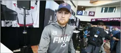  ?? DAVID ZALUBOWSKI — THE ASSOCIATED PRESS ?? Colorado’s Nathan MacKinnon heads to a television interview during media day on Tuesday in Denver.