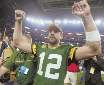  ?? AP PHOTOS ?? UPS AND DOWNS: Aaron Rodgers (above) celebrates after the Packers beat Dak Prescott (below) and the Cowboys yesterday to advance to the NFC title game.