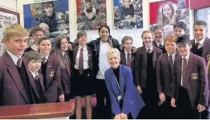  ??  ?? Olympian Shanaze Reade (back, centre), with pupils and staff at Tytheringt­on School