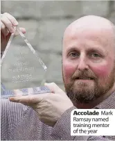  ??  ?? Accolade Mark Ramsay named training mentor of the year