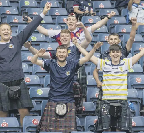  ??  ?? 0 A new generation of Scotland fans were able to watch their men's team play at a major finals for the first time