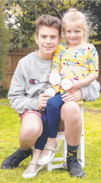  ??  ?? Young hero Will Landers and his younger sister Eliza. Picture: Wayne Taylor