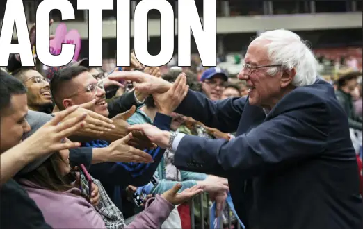  ?? (Juan Figueroa/The Dallas Morning News via AP) ?? Democratic presidenti­al candidate U.S. Sen. Bernie Sanders, I-Vt., greets supporters during a rally at the Mesquite Arena, Friday, Feb. 14, 2020, in Mesquite, Texas.