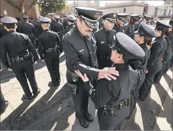  ?? Al Seib Los Angeles Times ?? LAPD CHIEF Charlie Beck conducts his last formal inspection in May. Beck’s unabashedl­y paternalis­tic rhetoric — “I am the LAPD,” he has said — leaves little distance between himself and the agency he leads.