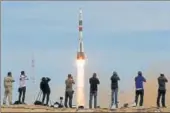  ?? REUTERS ?? A Soyuz space capsule on Thursday delivered an American astronaut making his first space flight and a veteran Russian cosmonaut to the Internatio­nal Space Station, completing the first twoman flight to the ISS in over a decade.