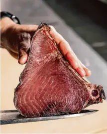  ?? ?? Diners often mistake dry-aged bigeye tuna for ribeye steak because of the coloring and texture.