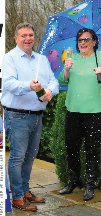  ?? ?? Bubbly: Richard and Debbie celebrate their EuroMillio­ns win yesterday