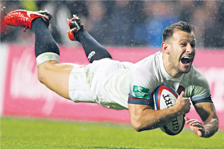  ??  ?? High-flyer: Danny Care seals his late, great cameo by crossing for England’s final try
