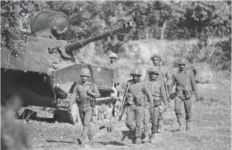  ?? ?? Indian infantry and tanks advance in East Pakistan