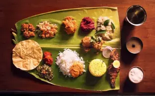  ??  ?? A meal served on a banana leaf at Visalam.