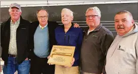  ?? Rebuilding Together / Contribute­d photo ?? Board members, from left, Bruce Adams, John Matta, Dennis Carter, Mike Bogues and Tom Voytek gather to honor Carter’s contributi­on to Rebuilding Together Litchfield County over the past decade.