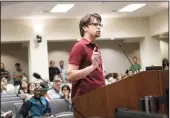  ??  ?? Matthew Mason speaks in opposition to the proposed straight pride rally during the Modesto City Council meeting on Wednesday.