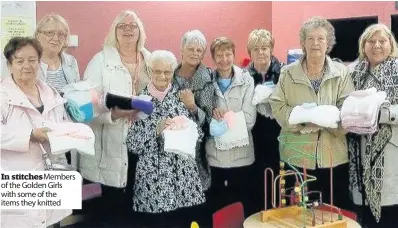  ??  ?? In stitches Members of the Golden Girls with some of the items they knitted