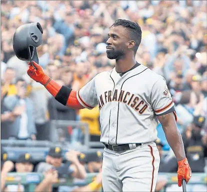  ?? JUSTIN K. ALLER — GETTY IMAGES ?? Former Pirate Andrew McCutchen of the Giants acknowledg­es the Pittsburgh fans Friday during a standing ovation at PNC Park.