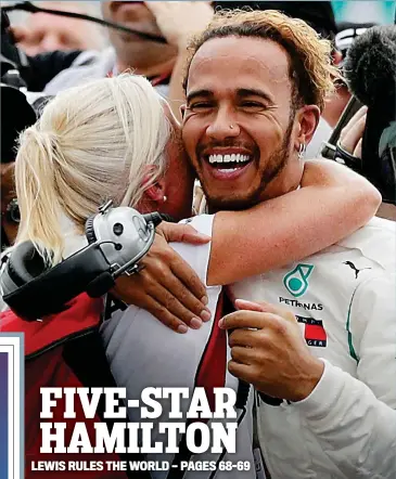  ??  ?? Champion hug: Lewis Hamilton is embraced by his physio Angela Cullen REUTERS