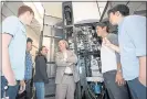  ?? DAWN HARMER — SLAC ?? Professor Wah Chiu and members of the new Stanford-SLAC team examines a cryogenic electron microscope.