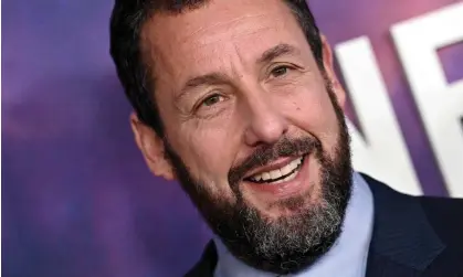  ?? Photograph: Axelle/Bauer-Griffin/FilmMagic ?? 73m reasons to smile … Adam Sandler.