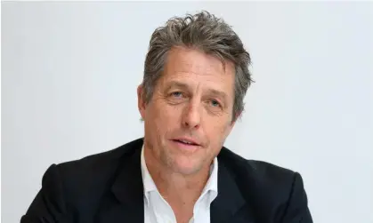  ?? Photograph: Magnus Sundholm/Rex/Shuttersto­ck ?? Hugh Grant’s decision to settle the claim is a significan­t blow to the wider case against the Sun, which involves other high-profile individual­s.