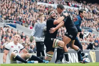  ?? Photo: INPHO/PHOTOSPORT ?? Great 8: Kieran Read, celebratin­g with Charles Piutau after scoring against England, was the best player on the best team in rugby.