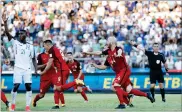  ?? AP PHOTO BY REBECCA BLACKWELL ?? United States' Bobby Wood, 9, celebrates with teammates after scoring his team's first goal during a 2018 World Cup qualifying soccer match against Honduras in San Pedro Sula, Honduras, Tuesday.