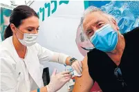  ?? JACK GUEZ AFP/GETTY IMAGES FILE PHOTO ?? Israel, which swiftly vaccinated anyone over 60, has seen a dramatic decrease in illness and death among senior residents.