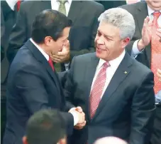  ??  ?? El presidente Enrique Peña Nieto, junto con David Penchyna, director general del Infonavit, durante la realizació­n de la 115 asamblea general del instituto.