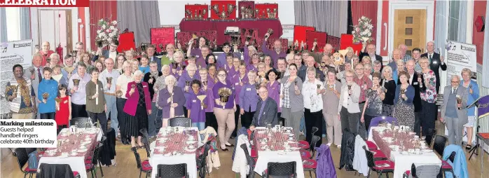  ??  ?? Marking milestone Guests helped handbell ringers celebrate 40th birthday