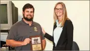  ?? / Doug Walker ?? Department of Community Supervisio­n Officer Cody Franklin, above left, was one of two local DCS officers honored Tuesday by Tracy Alvord, executive director of the Sex Offender Registrati­on Review Board. Floyd County Department of Community Supervisio­n Officer Brandon Henderson,below, was also honored for work to clarify state law with respect to supervisio­n of sex offenders.