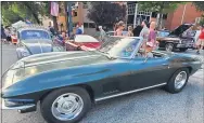  ?? IMAGE FROM SCREENSHOT ?? This image shows a car on display at the Red Horse Motoring Club’s downtown Pottstown car show on Aug. 1. Few masks are evident among those attending.