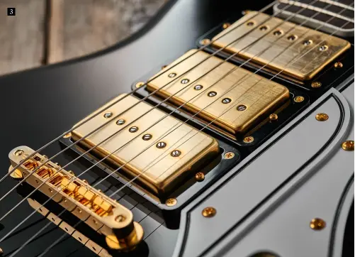  ??  ?? 3 3. Like the original Triple Tone, the Tri Tone has three pickups. All are humbucking-sized but are actually single coils under their brushed gold-plated covers
