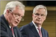  ?? GEERT VANDEN WIJNGAERT — THE ASSOCIATED PRESS FILE ?? In this Thursday file photo, EU chief Brexit negotiator Michel Barnier, right, and British Secretary of State David Davis address the media after a week of negotiatio­ns at EU headquarte­rs in Brussels. Since the June 8 British election, there has been a...