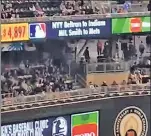  ?? @TwinkieTow­n/Twitter ?? TRADE OFF: The scoreboard at Target Field on Thursday night trumpet Yankees and Mets trades that didn’t actually occur.