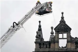  ??  ?? Firefighte­rs did their best but couldn’t save Accrington Conservati­ve Club from a devastatin­g fire in May