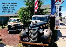  ??  ?? VINTAGE VIEW: Old cars outside a store in the Route 66 town of Seligman