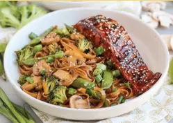  ??  ?? Asian Barbecue Sesame Salmon with Noodles and Veggies