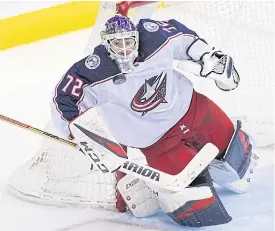  ??  ?? Blue Jackets goaltender Sergei Bobrovsky stops the puck during the third period.