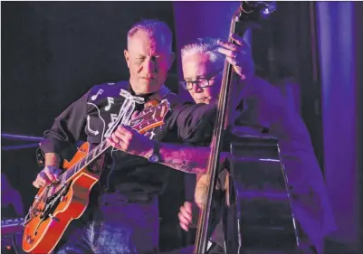  ?? Elizabeth Brumley Las Vegas Review-journal @Elipagepho­to ?? Reverend Horton Heat’s Jim Heath, left, and Jimbo Wallace perform Thursday at the Fremont Country Club.