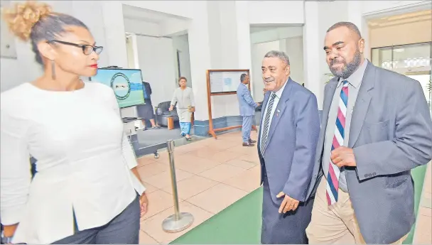  ?? Picture: RAMA ?? Opposition members Lynda Tabuya (left), Ratu Suliano Matanitobu­a and Mosese Bulitavu during a Parliament break yesterday.