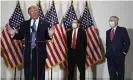  ??  ?? Donald Trump speaks as Senators John Barrasso and Mitch McConnell wear masks. Photograph: Patrick Semansky/AP
