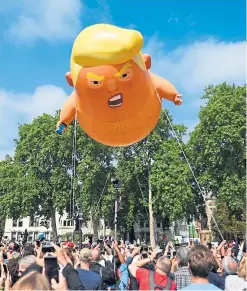  ?? Picture: AP. ?? The inflatable during Mr Trump’s visit last July.