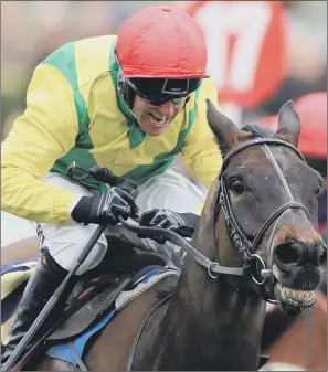  ??  ?? Robbie Power on Sizing John rides to victory in the Cheltenham Gold Cup Chase.