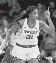  ?? AP/ALONZO ADAMS ?? The presence of 6-8 center Kalani Brown (21) makes Baylor a legitimate threat to win the NCAA women’s championsh­ip. Unlike past years when Connecticu­t was the overwhelmi­ng favorite to win it all, this year there are several different teams that could win the championsh­ip.