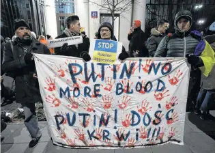  ?? PHOTO: REUTERS ?? Anger . . . Protesters gather in front of the Russian embassy yesterday after Russia seized three Ukrainian naval ships and detained the crew earlier this week, in Warsaw, Poland.