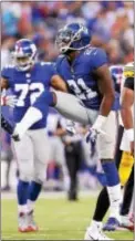  ?? JOHN BLAINE — FOR THE TRENTONIAN ?? Giants safety Landon Collins (21) celebrates after making a stop on third down during Friday night’s preseason game against the Pittsburgh Steelers at MetLife Stadium.