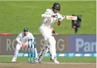  ?? – AFP ?? FOCUSSED: New Zealand’s Jeet Raval plays a shot on the second day of their third Test match against South Africa at Seddon Park in Hamilton on Sunday.